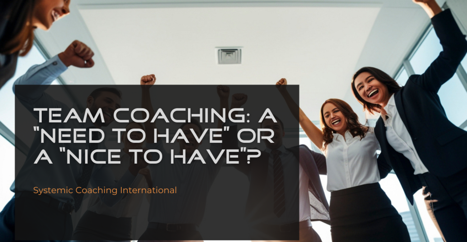 Business team celebrating success together representing team coaching, collaboration, and high-performing teams